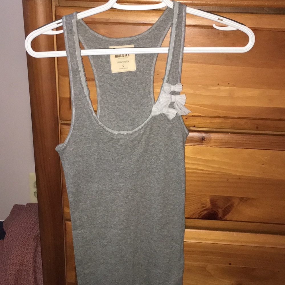 Gray tank top, size small with 3 bows on the side